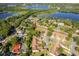 Aerial view of property showcasing proximity to lakes and lush greenery at 168 Hill St, Casselberry, FL 32707