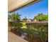 The backyard has a large grassy area that is surrounded by greenery to add privacy at 168 Hill St, Casselberry, FL 32707