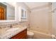 The classic bathroom is equipped with a shower/tub combo and plenty of storage at 168 Hill St, Casselberry, FL 32707