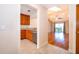 View of the kitchen from the living room featuring hardwood floors and a ceiling fan at 168 Hill St, Casselberry, FL 32707