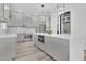 Contemporary kitchen design with stainless steel appliances and a central island at 17657 Windy Pine St, Montverde, FL 34756