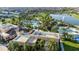 Stunning aerial view showcasing the community pool, fitness center, and surrounding lush landscaping at 1836 Sandy Park Trl, Kissimmee, FL 34747