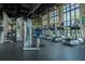 Community gym showcasing modern weight training and fitness equipment, and ample natural light from large windows at 1836 Sandy Park Trl, Kissimmee, FL 34747