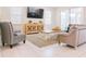 Comfortable living space with modern furniture, a sleek TV, and access to the outdoor area at 1836 Sandy Park Trl, Kissimmee, FL 34747