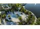 Overhead shot of the splash pad with slides and a tropical landscape in a Gathering-friendly community at 1836 Sandy Park Trl, Kissimmee, FL 34747