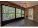 Screened patio with brick accent wall offering a peaceful outdoor retreat at 2085 Friar Tuck Ln, Orange City, FL 32763