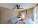 Cozy bedroom with neutral tones and two twin beds at 2506 Shelby Cir, Kissimmee, FL 34743