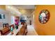 Elegant dining room with a chandelier, a table set for dining, and vibrant wall colors at 2506 Shelby Cir, Kissimmee, FL 34743
