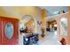 Inviting entryway with an office desk, an open floor plan, and stylish decor at 2506 Shelby Cir, Kissimmee, FL 34743
