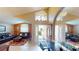 Welcoming entryway with an office space, an open-concept layout, and modern lighting at 2506 Shelby Cir, Kissimmee, FL 34743