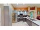 Modern kitchen featuring stainless steel appliances, sleek cabinetry, and stylish countertops at 2506 Shelby Cir, Kissimmee, FL 34743