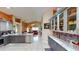 Well-appointed kitchen featuring stone countertops, stainless steel appliances, and ample cabinet space at 2506 Shelby Cir, Kissimmee, FL 34743