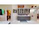 Stylish kitchen area with custom cabinetry and elegant decor, perfect for displaying collectibles at 2506 Shelby Cir, Kissimmee, FL 34743