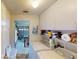 Functional laundry room with washer, dryer, and ample storage space at 2506 Shelby Cir, Kissimmee, FL 34743