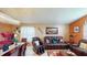 Cozy living room with a dining table, comfortable seating, and bright decor at 2506 Shelby Cir, Kissimmee, FL 34743