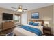 Relaxing bedroom with modern furniture, natural light, and comfortable bedding for a peaceful retreat at 2963 Beckwith St, Deltona, FL 32738