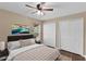 Cozy bedroom featuring a comfortable bed, neutral decor, and a soft rug for a relaxing ambiance at 2963 Beckwith St, Deltona, FL 32738