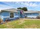Bright blue single-Gathering home boasting lush lawn and well-maintained landscaping at 2963 Beckwith St, Deltona, FL 32738