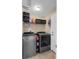 Laundry room with washer, dryer, and shelving for optimal organization and convenience at 2963 Beckwith St, Deltona, FL 32738