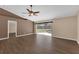 Living area with hardwood floors and natural light from sliding glass door at 2963 Beckwith St, Deltona, FL 32738