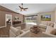Living room with sliding glass doors to backyard with virtual staging at 2963 Beckwith St, Deltona, FL 32738