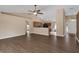 Spacious living area featuring vaulted ceiling, hardwood floors and an open layout at 2963 Beckwith St, Deltona, FL 32738
