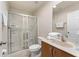 Well-lit bathroom featuring a glass-door shower and a stylish vanity, creating a comfortable and functional space at 3002 Secret Lake Dr, Kissimmee, FL 34747