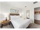 Serene bedroom with a king bed, bedside tables, lamps, and contemporary decor, creating a relaxing retreat at 3002 Secret Lake Dr, Kissimmee, FL 34747