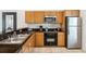 Well-equipped kitchen featuring stainless steel appliances and ample cabinet space at 3002 Secret Lake Dr, Kissimmee, FL 34747