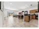 Open-concept living and dining area, with tile floors and plenty of natural light at 3002 Secret Lake Dr, Kissimmee, FL 34747