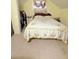 Cozy bedroom featuring a comfortable bed and a window with decorative curtains at 319 N Scenic Hwy, Frostproof, FL 33843