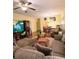 Inviting living room with a sectional sofa, entertainment center, and comfortable furnishings at 319 N Scenic Hwy, Frostproof, FL 33843