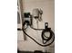 The home features a convenient electric vehicle (EV) charging station in the garage at 341 Alexzander Way, Winter Haven, FL 33881
