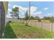 Spacious backyard with a privacy fence and well-maintained grass lawn at 4122 Sagefield Dr, St Cloud, FL 34773