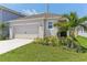Charming home with a two-car garage, landscaped yard, and freshly painted exterior, located on a quiet street at 4122 Sagefield Dr, St Cloud, FL 34773