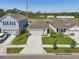 Charming single Gathering home featuring a well manicured lawn and attached two car garage at 4122 Sagefield Dr, St Cloud, FL 34773