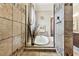 Shower behind glass partition next to soaking tub with decorative window treatments at 4133 Foxhound Dr, Clermont, FL 34711
