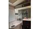 Bright bathroom featuring a soaking tub, modern vanity, and contemporary fixtures at 4186 Buglers Rest Pl, Casselberry, FL 32707