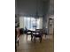Dining area with large chandelier and natural light at 4186 Buglers Rest Pl, Casselberry, FL 32707