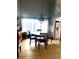 Dining area with large chandelier and natural light at 4186 Buglers Rest Pl, Casselberry, FL 32707
