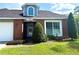 Charming home exterior boasting a well-maintained lawn, beautiful landscaping, and a welcoming entrance at 4186 Buglers Rest Pl, Casselberry, FL 32707