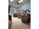 Open-concept living room with comfortable leather seating, tile floor, and a ceiling fan at 4186 Buglers Rest Pl, Casselberry, FL 32707