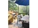 This screened-in patio features an outdoor kitchen complete with a built-in grill for perfect barbecues at 4186 Buglers Rest Pl, Casselberry, FL 32707