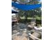 Large screened patio with outdoor kitchen, dining, ample seating and views of the backyard at 4186 Buglers Rest Pl, Casselberry, FL 32707