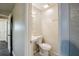 The image shows a small bathroom with a toilet, sink and vanity, and wall mirror at 4200 Colony Way, Orlando, FL 32808