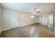 The image shows a spacious room with wood-look floors and access to a closet at 4200 Colony Way, Orlando, FL 32808