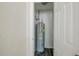 A peek inside a closet at the modern water heater at 4200 Colony Way, Orlando, FL 32808