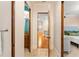 Hallway with access to the bedroom, bathroom and staircase at 4400 New Broad St, Orlando, FL 32814