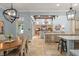 Open kitchen featuring an expansive island, large pantry and access to outdoor entertaining at 4400 New Broad St, Orlando, FL 32814