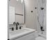 Stylish bathroom with marble shower and black fixtures at 461 Black Knight Way, Longwood, FL 32779
